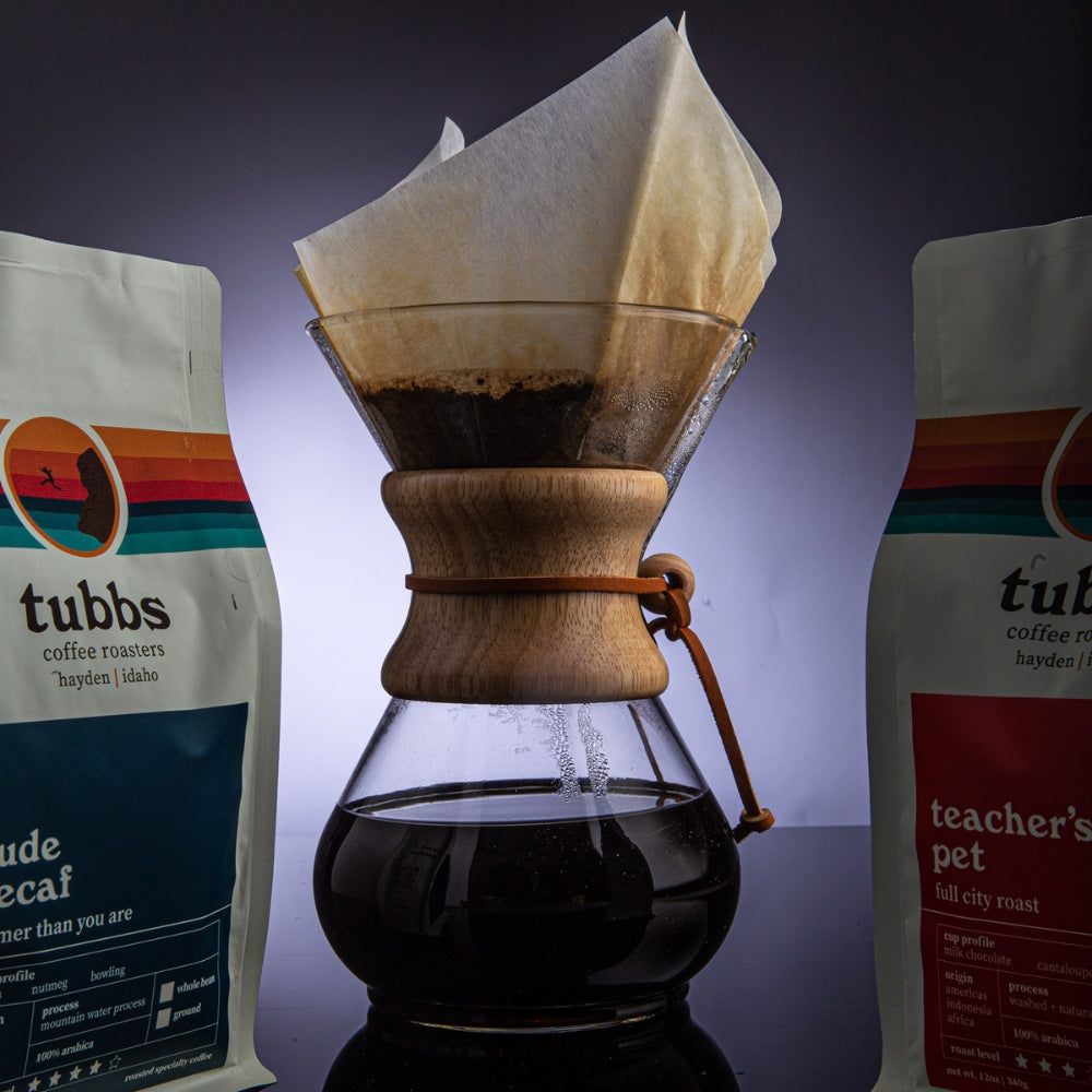 coffee pot with 2 bags of tubbs coffee either side